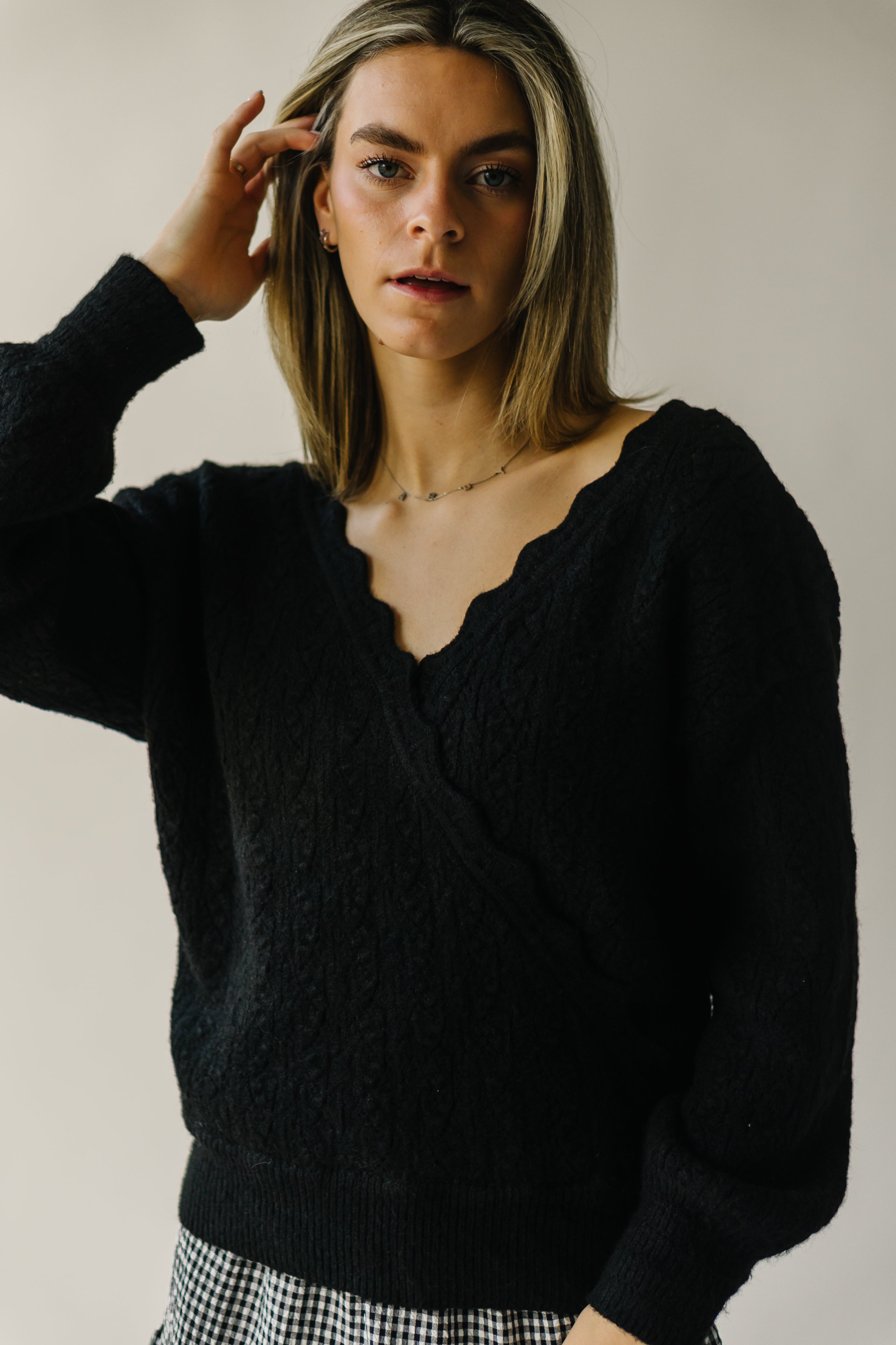 The Tagger Knit Wrap Sweater in Black